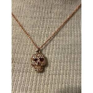 Betsey Johnson, goldtone Crystal started skull pendant